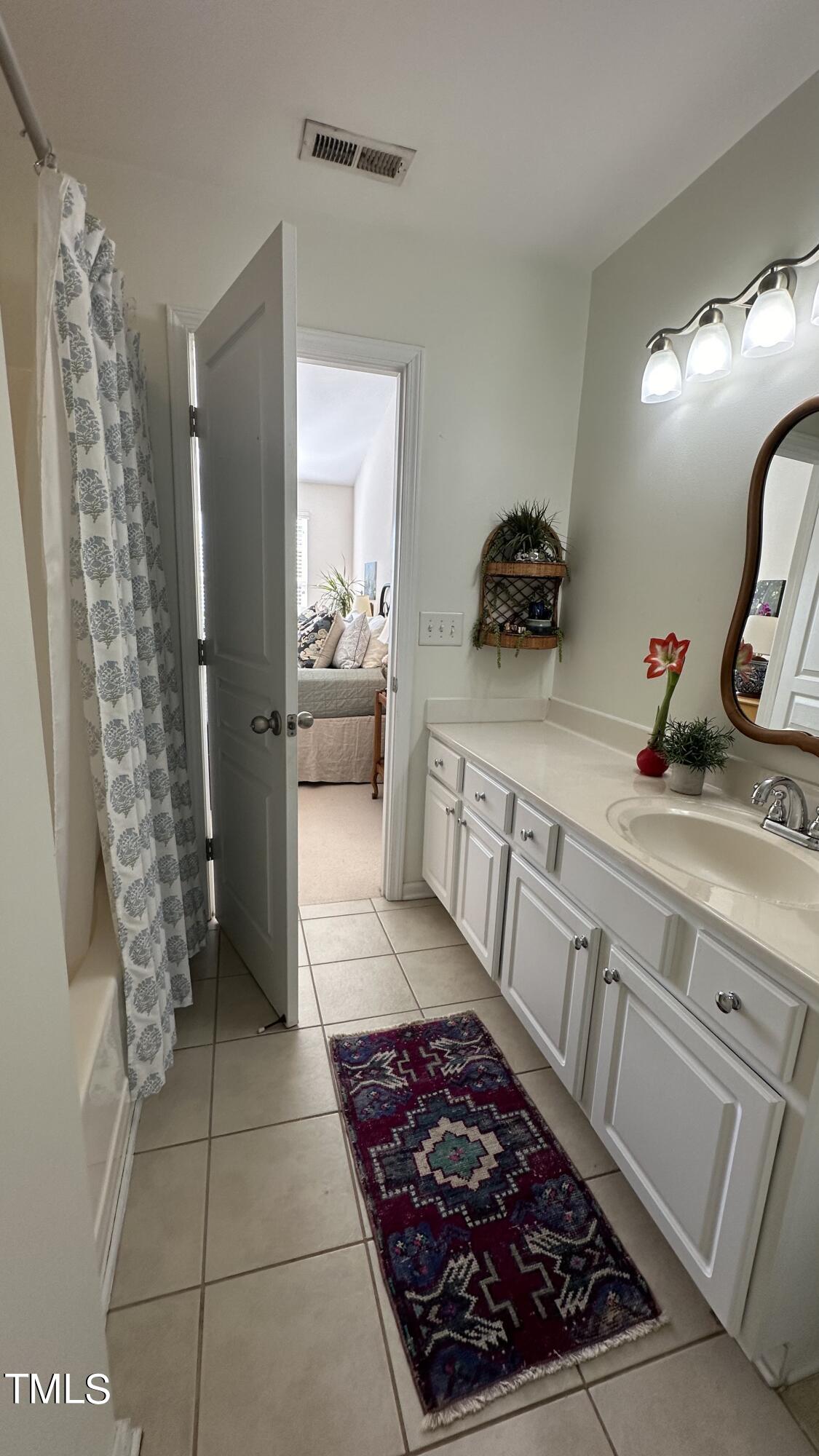 5109 Singing Wind Drive Raleigh, NC 27612 - Photo 18 of 24 Owners bath