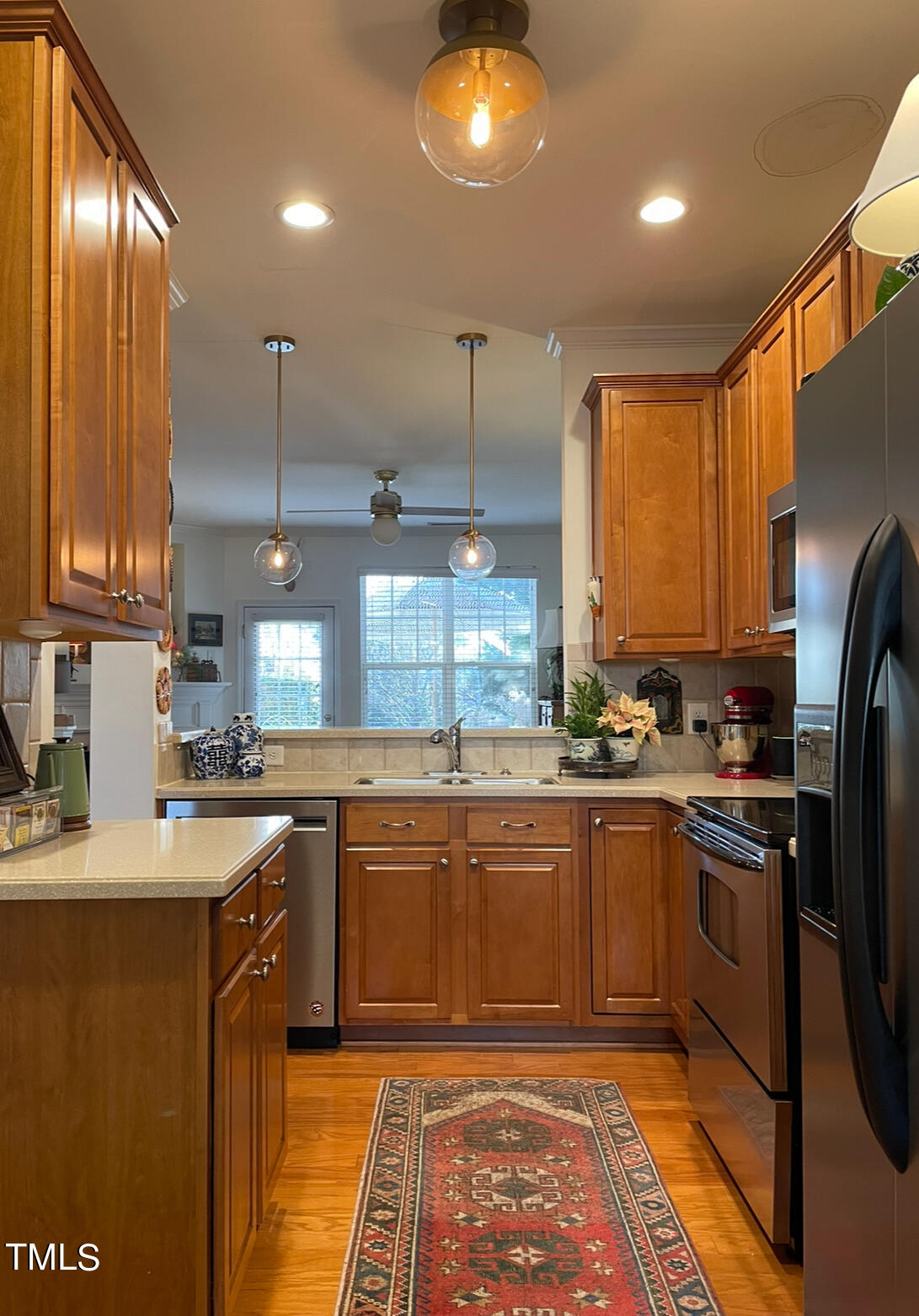 5109 Singing Wind Drive Raleigh, NC 27612 - Photo 8 of 24 Kitchen, Open to Family Room