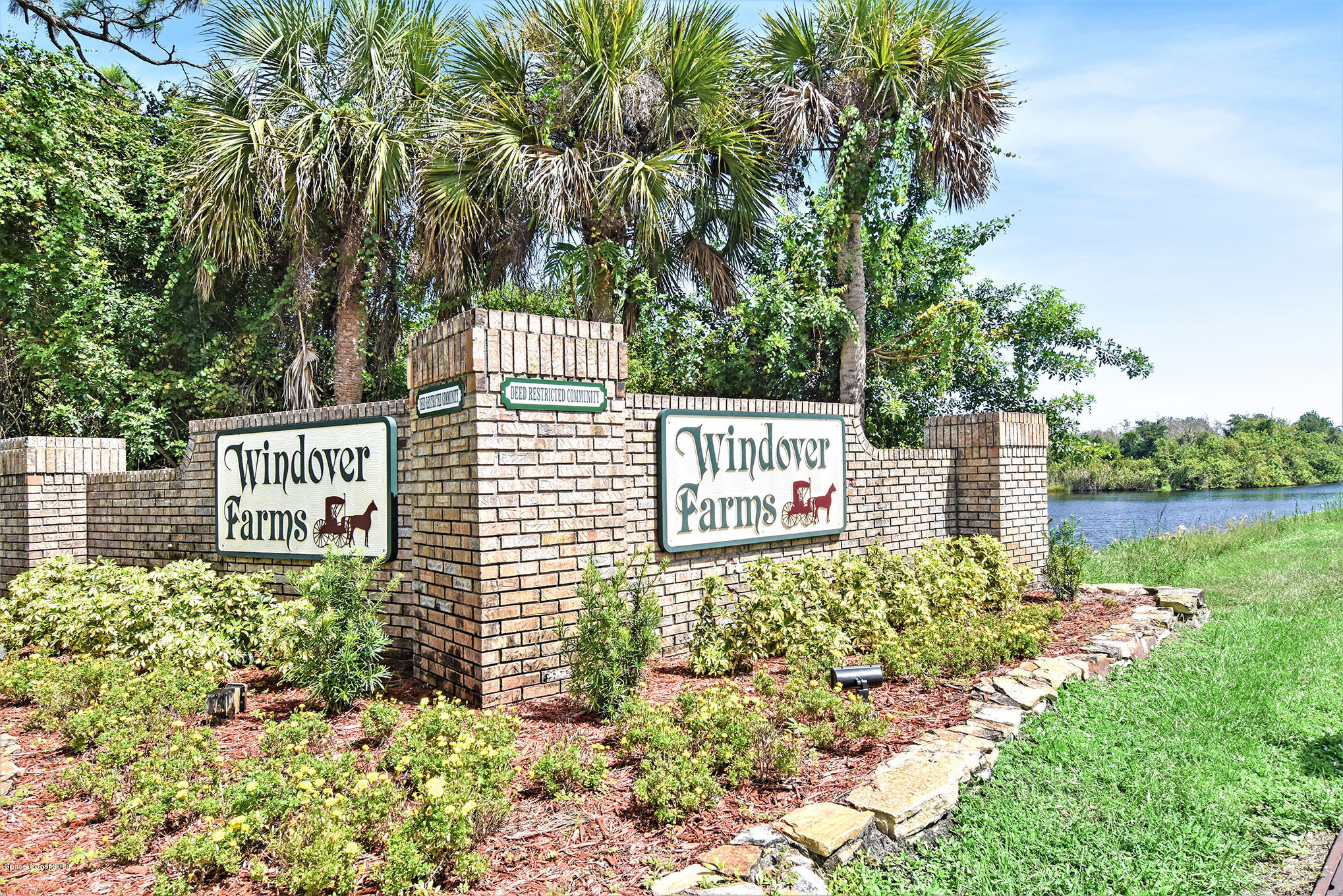 4195 Turtle Mound Road Melbourne, FL 32934 - Photo 6 of 53 entrance to subdivision