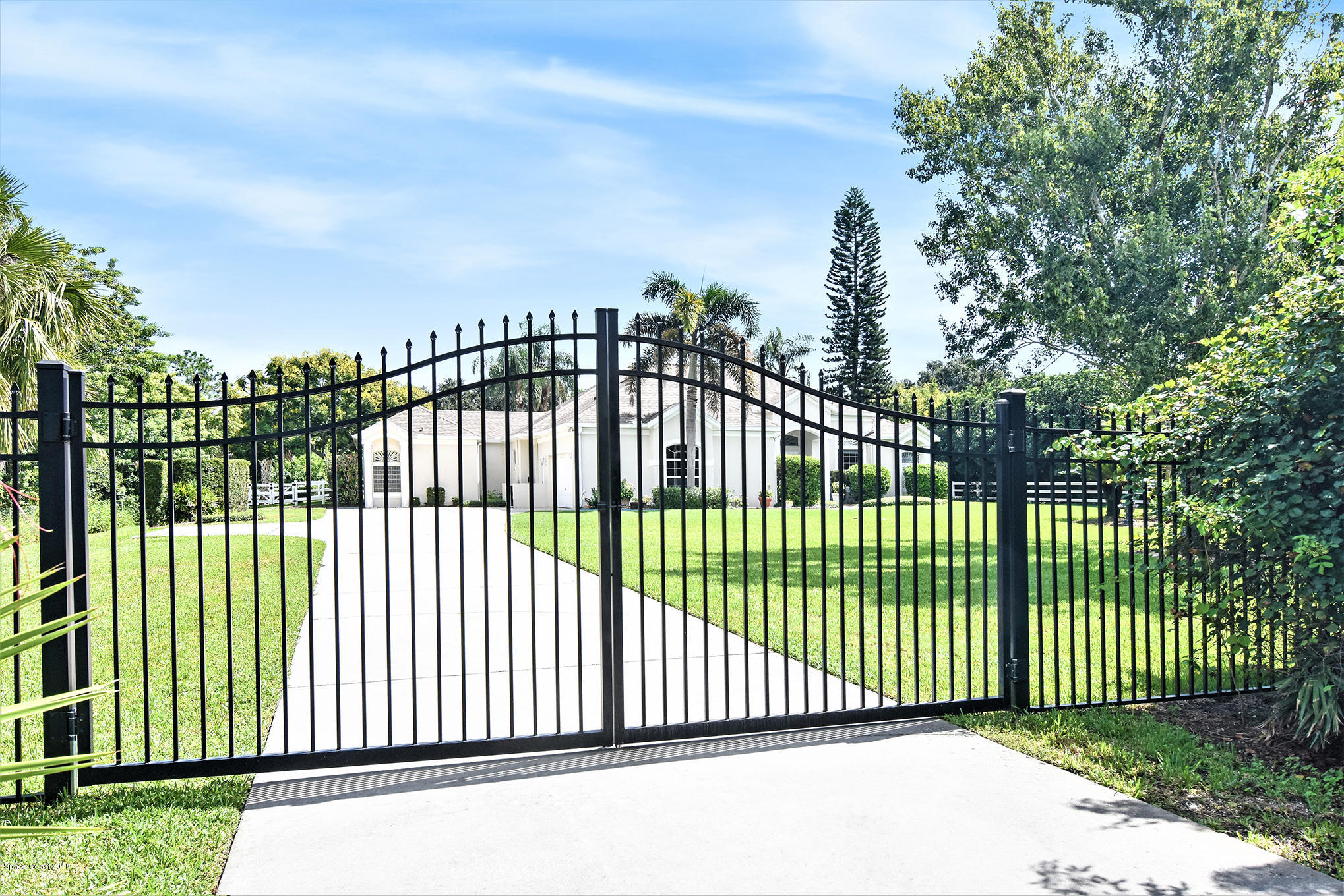 4195 Turtle Mound Road Melbourne, FL 32934 - Photo 7 of 53 entrance to driveway