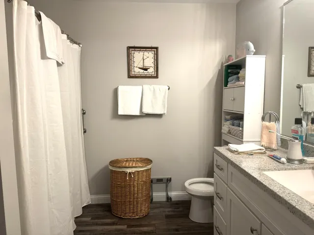 a room with furniture and cabinet