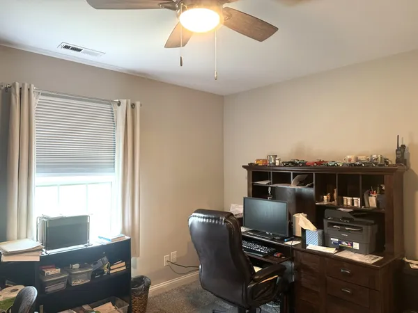 a view of a hallway with closet
