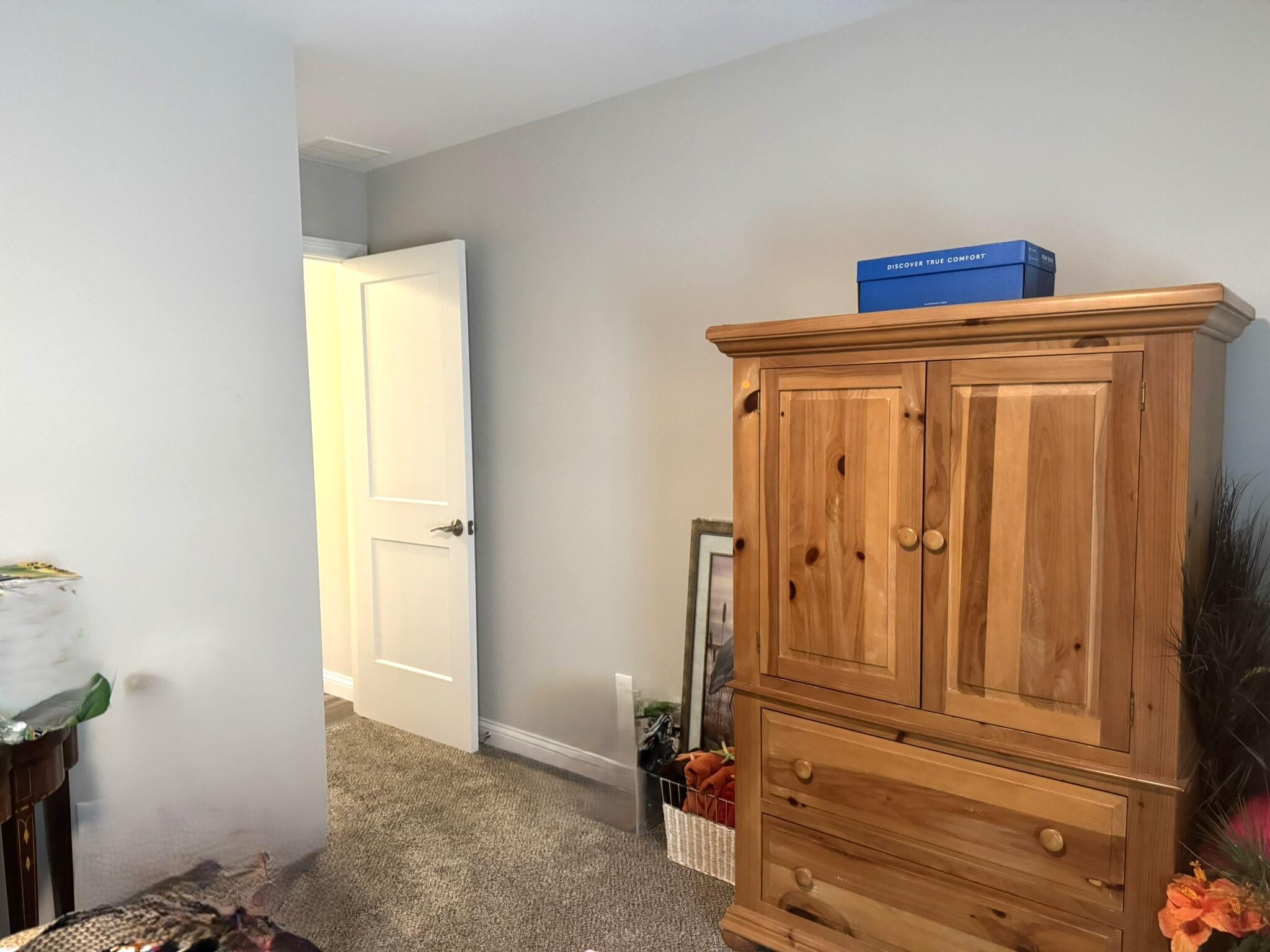 925 6th Avenue Northwest De Motte, IN 46310 - Photo 17 of 22 a view of a hallway with closet