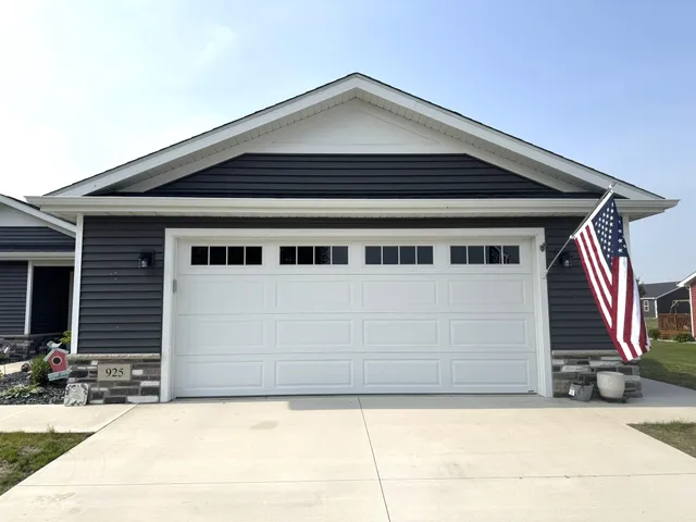 a view of house with yard