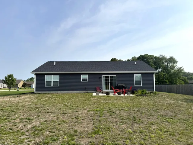 a house view with a garden space