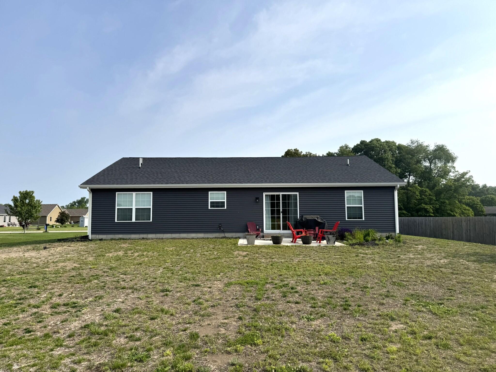 925 6th Avenue Northwest De Motte, IN 46310 - Photo 5 of 22 a house view with a garden space