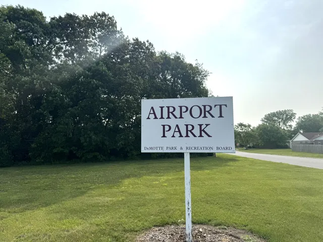a view of a swimming pool with an outdoor seating