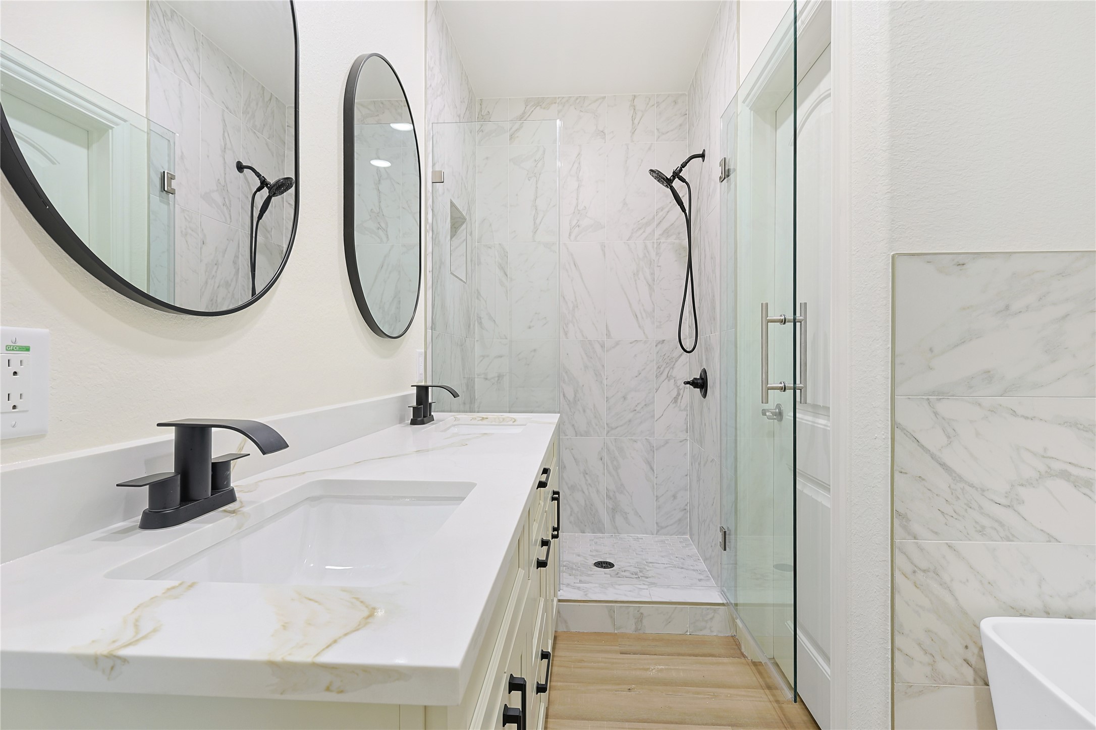 2317 Cedar Street Pearland, TX 77581 - Photo 20 of 33 a bathroom with a sink and a mirror