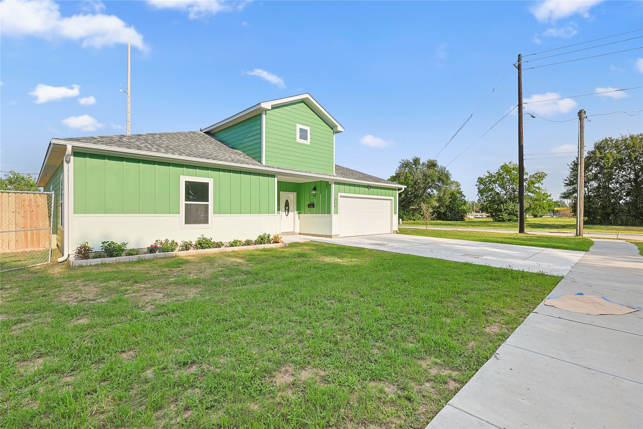 2317 Cedar Street Pearland, TX 77581 - Photo 2 of 33 a front view of a house with garden