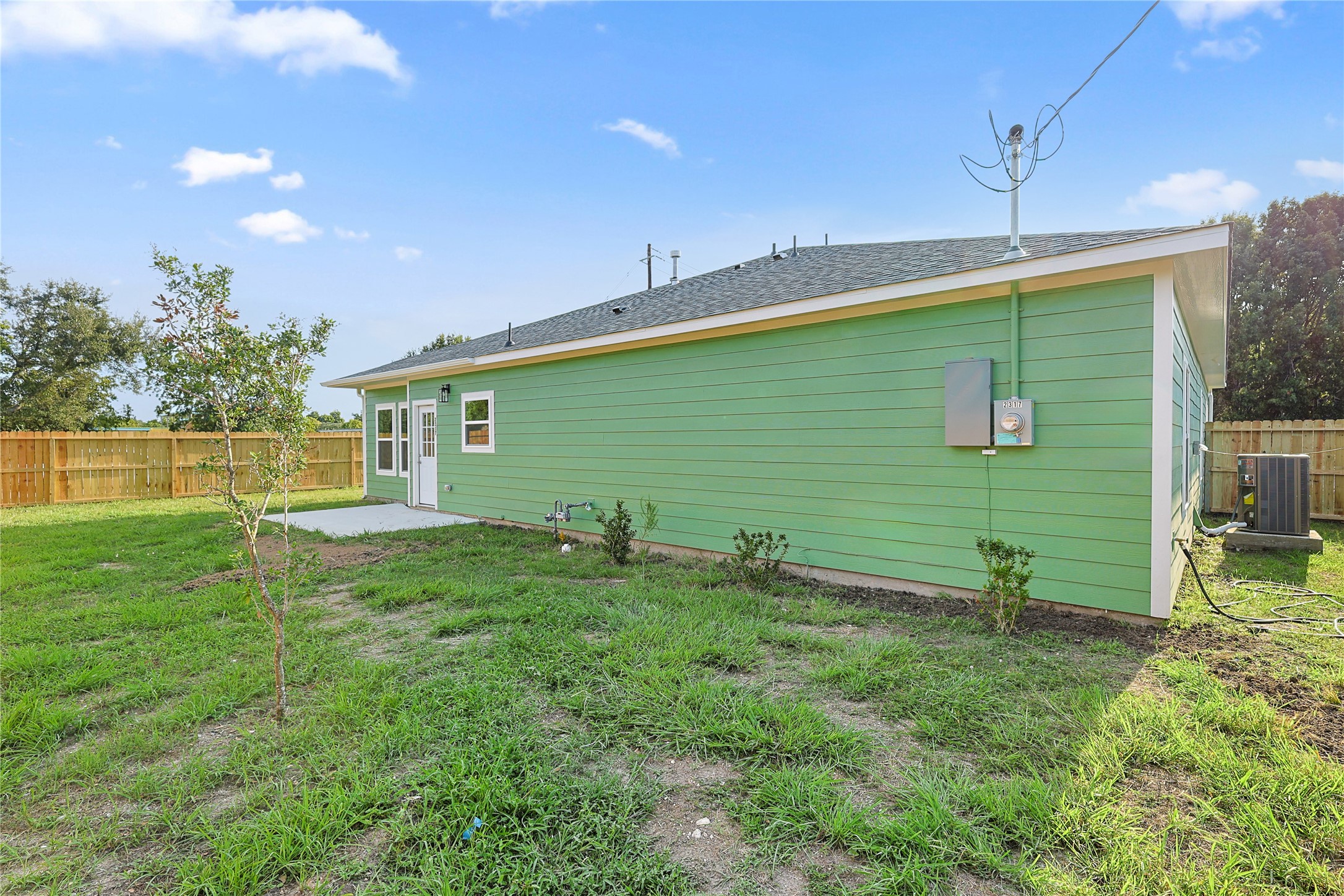 2317 Cedar Street Pearland, TX 77581 - Photo 27 of 33 a backyard of a house with table and chairs