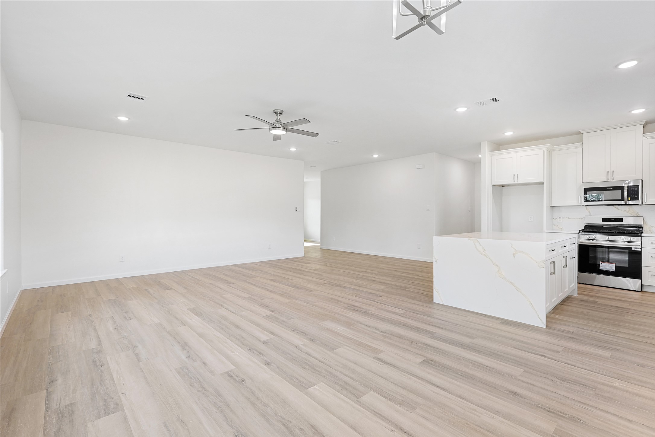 2317 Cedar Street Pearland, TX 77581 - Photo 8 of 33 a view of kitchen with sink and wooden floor