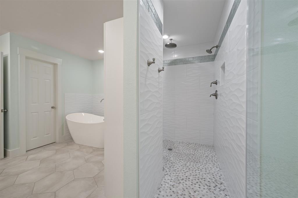 7384 Rector Road Sanger, TX 76266 - Photo 18 of 40 a bathroom with a granite countertop shower and a sink