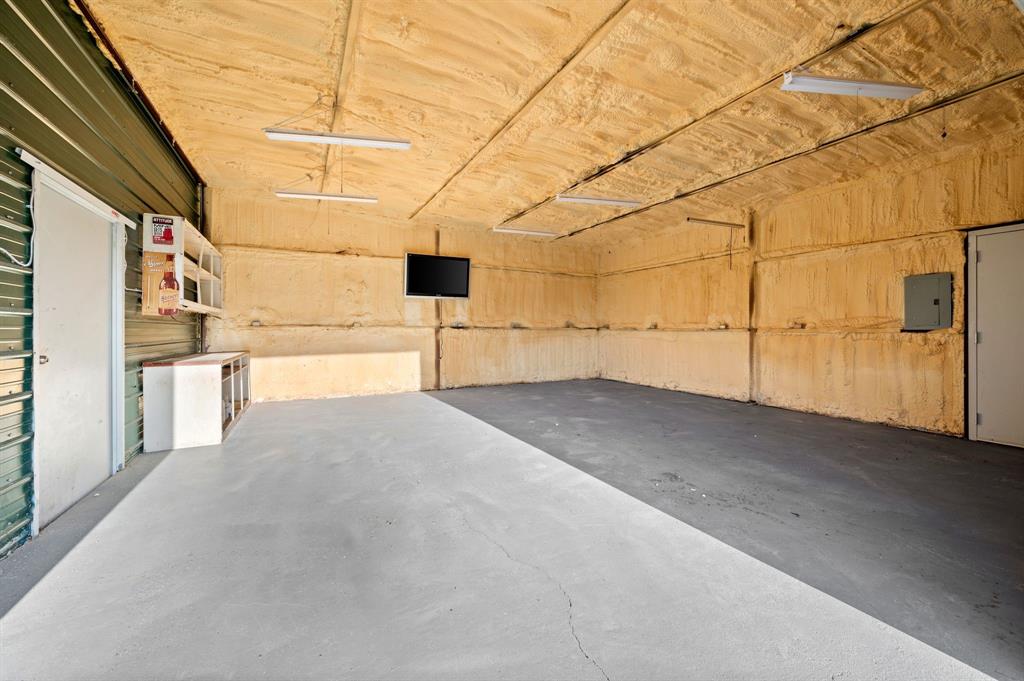 7384 Rector Road Sanger, TX 76266 - Photo 31 of 40 a view of a room with wooden walls