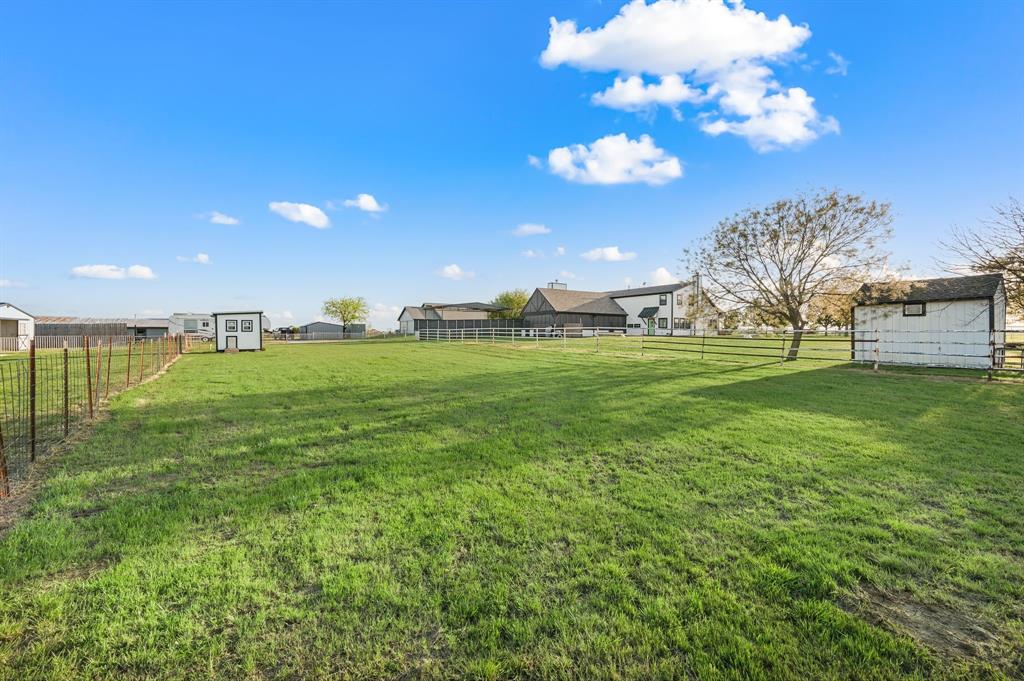 7384 Rector Road Sanger, TX 76266 - Photo 33 of 40 a view of a golf course with a big yard