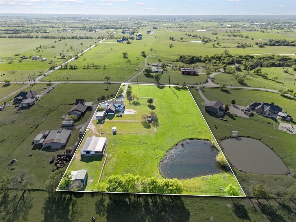 7384 Rector Road Sanger, TX 76266 - Photo 36 of 40 an aerial view of a pool with a yard