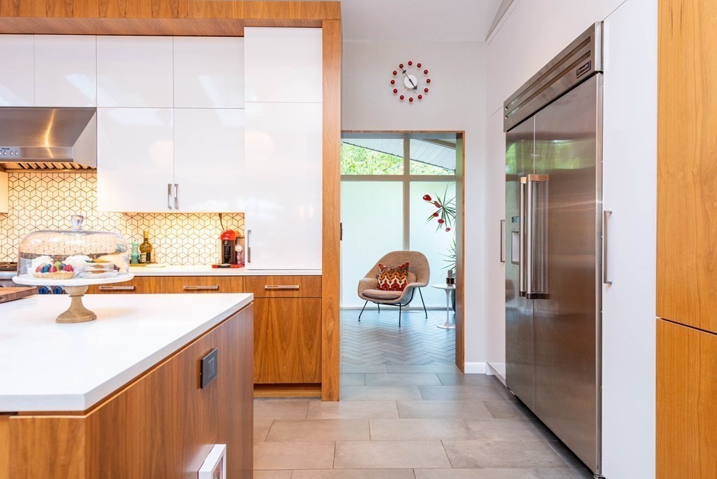 12 Alexandra Road Lynnfield, MA 01940 - Photo 14 of 42 a kitchen with a sink and a refrigerator
