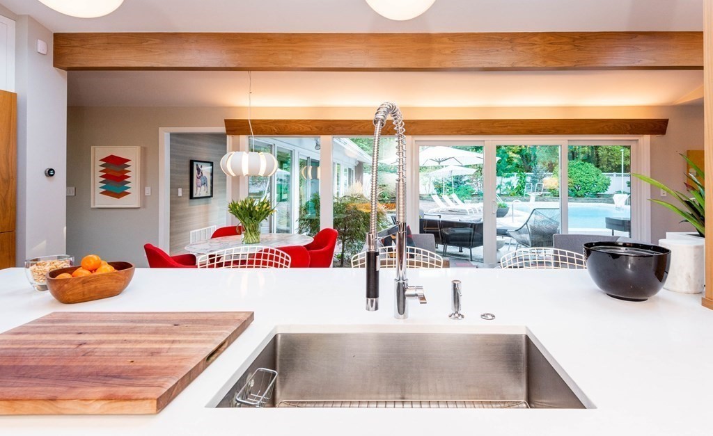 12 Alexandra Road Lynnfield, MA 01940 - Photo 17 of 42 a living room with furniture and a floor to ceiling window