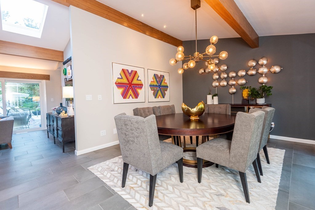 12 Alexandra Road Lynnfield, MA 01940 - Photo 19 of 42 a dining room with furniture a chandelier and window