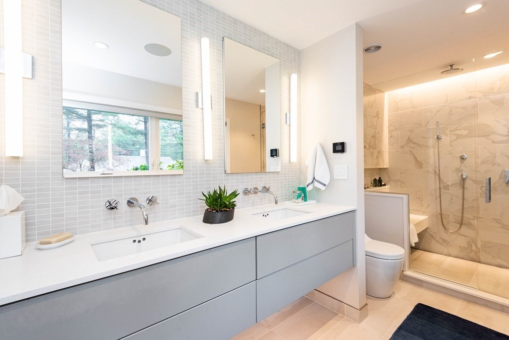 12 Alexandra Road Lynnfield, MA 01940 - Photo 22 of 42 a bathroom with a sink a toilet and tub