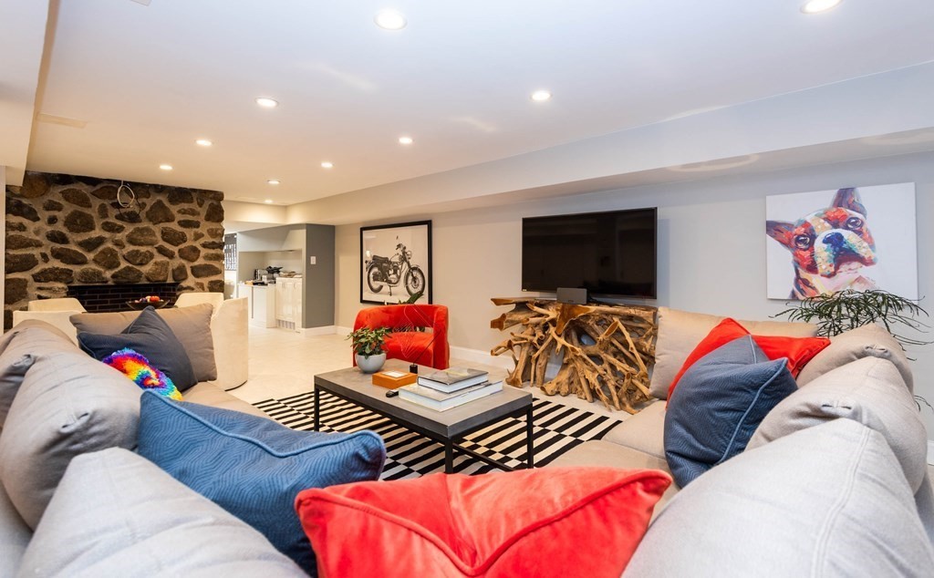 12 Alexandra Road Lynnfield, MA 01940 - Photo 31 of 42 a living room with furniture and a flat screen tv