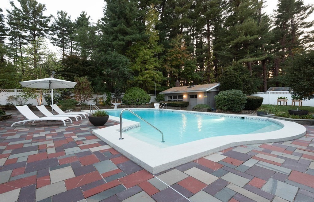 12 Alexandra Road Lynnfield, MA 01940 - Photo 33 of 42 a view of a swimming pool with a patio