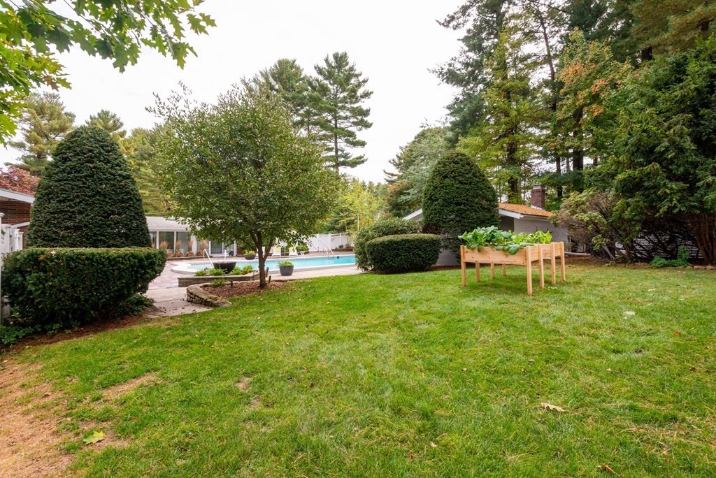 12 Alexandra Road Lynnfield, MA 01940 - Photo 35 of 42 a view of a backyard with sitting area