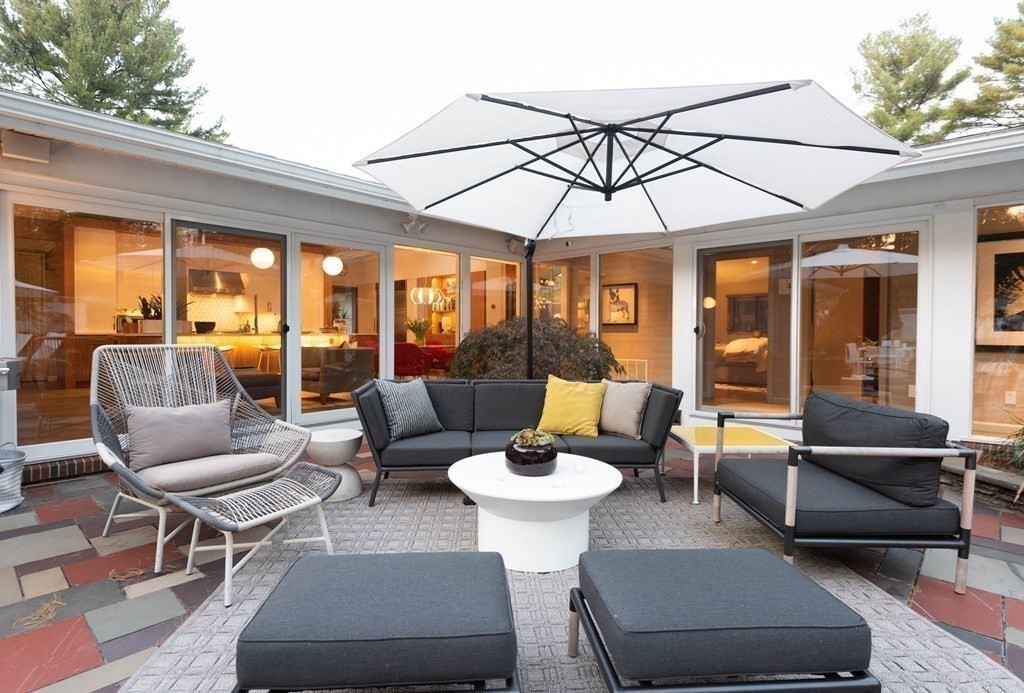 12 Alexandra Road Lynnfield, MA 01940 - Photo 36 of 42 a patio with patio a couch and chairs