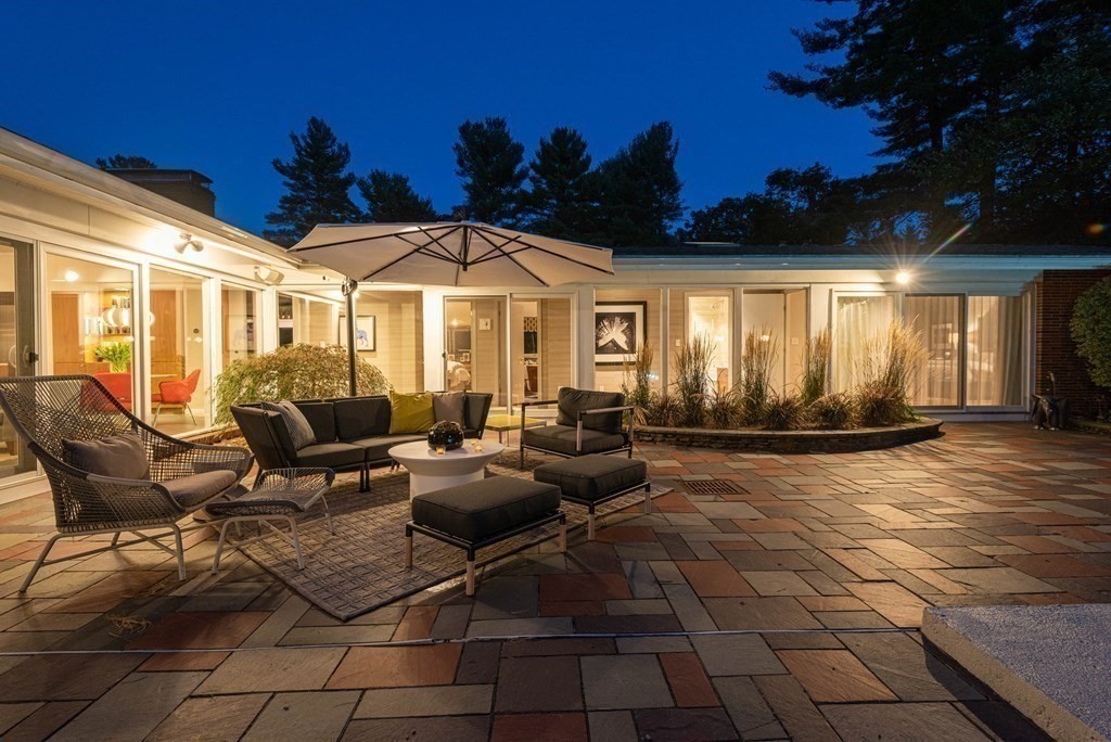 12 Alexandra Road Lynnfield, MA 01940 - Photo 38 of 42 a living room with patio furniture and a potted plant