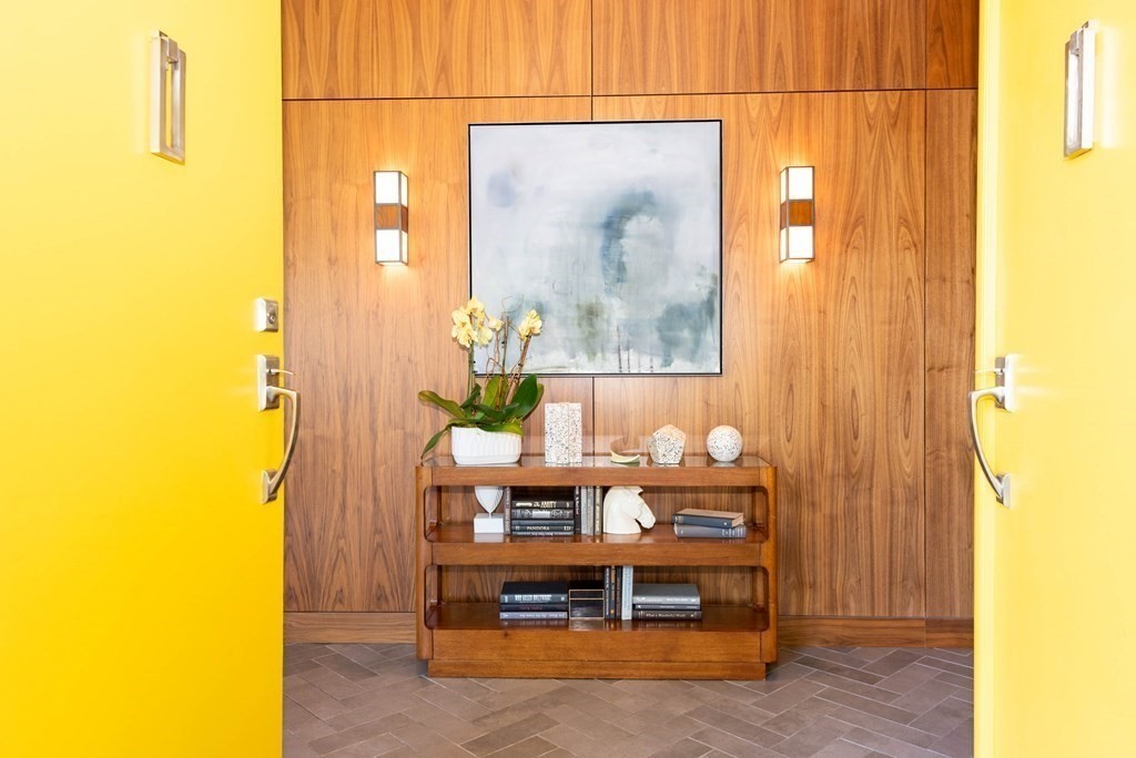 12 Alexandra Road Lynnfield, MA 01940 - Photo 4 of 42 a view of a room with a table and chairs