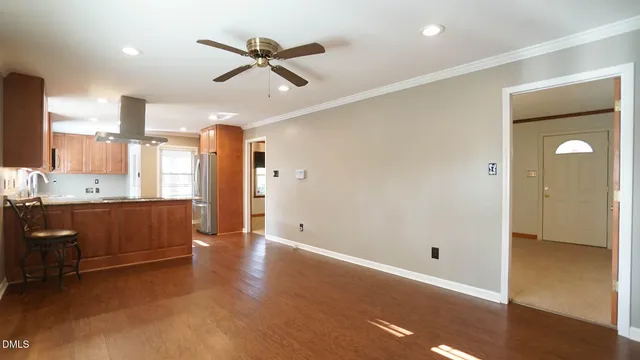 a view of workspace with wooden floor and window