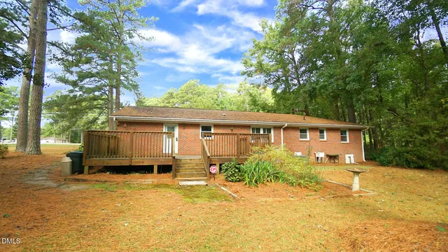 a view of a house with a swimming pool