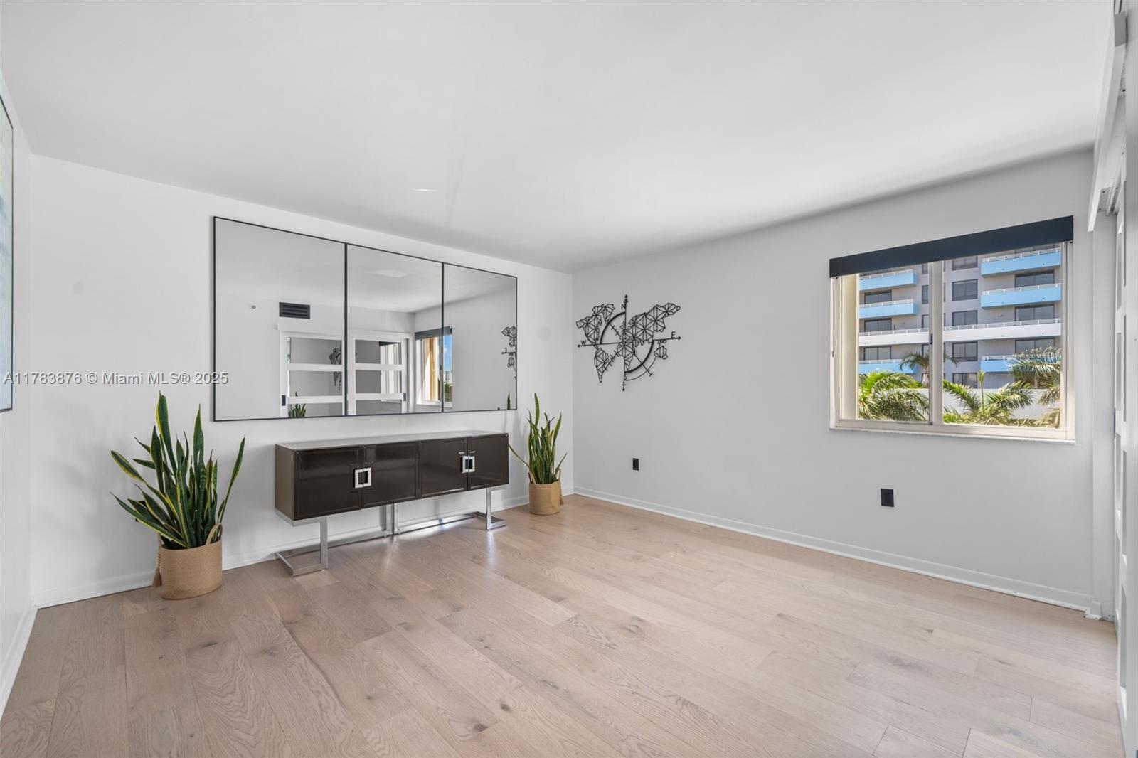 1401 Bay Road, Unit 506 Miami Beach, FL 33139 - Photo 16 of 28 a living room with furniture and potted plant