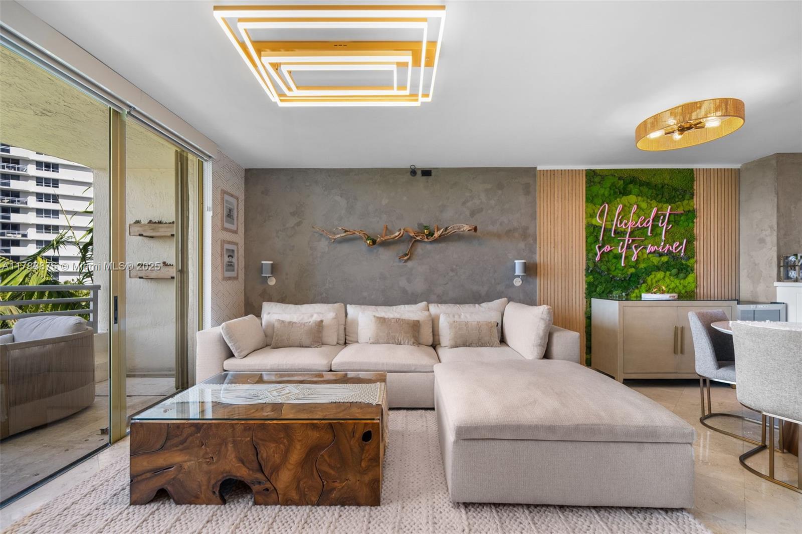 1401 Bay Road, Unit 506 Miami Beach, FL 33139 - Photo 4 of 28 a living room with furniture and a floor to ceiling window