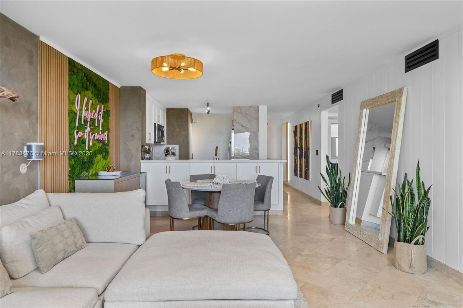 1401 Bay Road, Unit 506 Miami Beach, FL 33139 - Photo 5 of 28 a living room with furniture and a floor to ceiling window