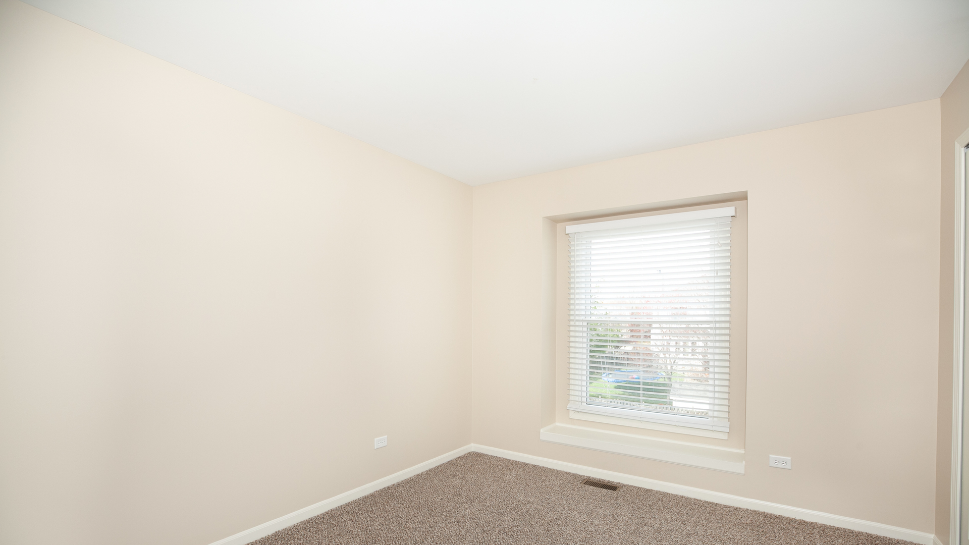 24856 Vermette Road Plainfield, IL 60585 - Photo 11 of 18 a view of an empty room with a window