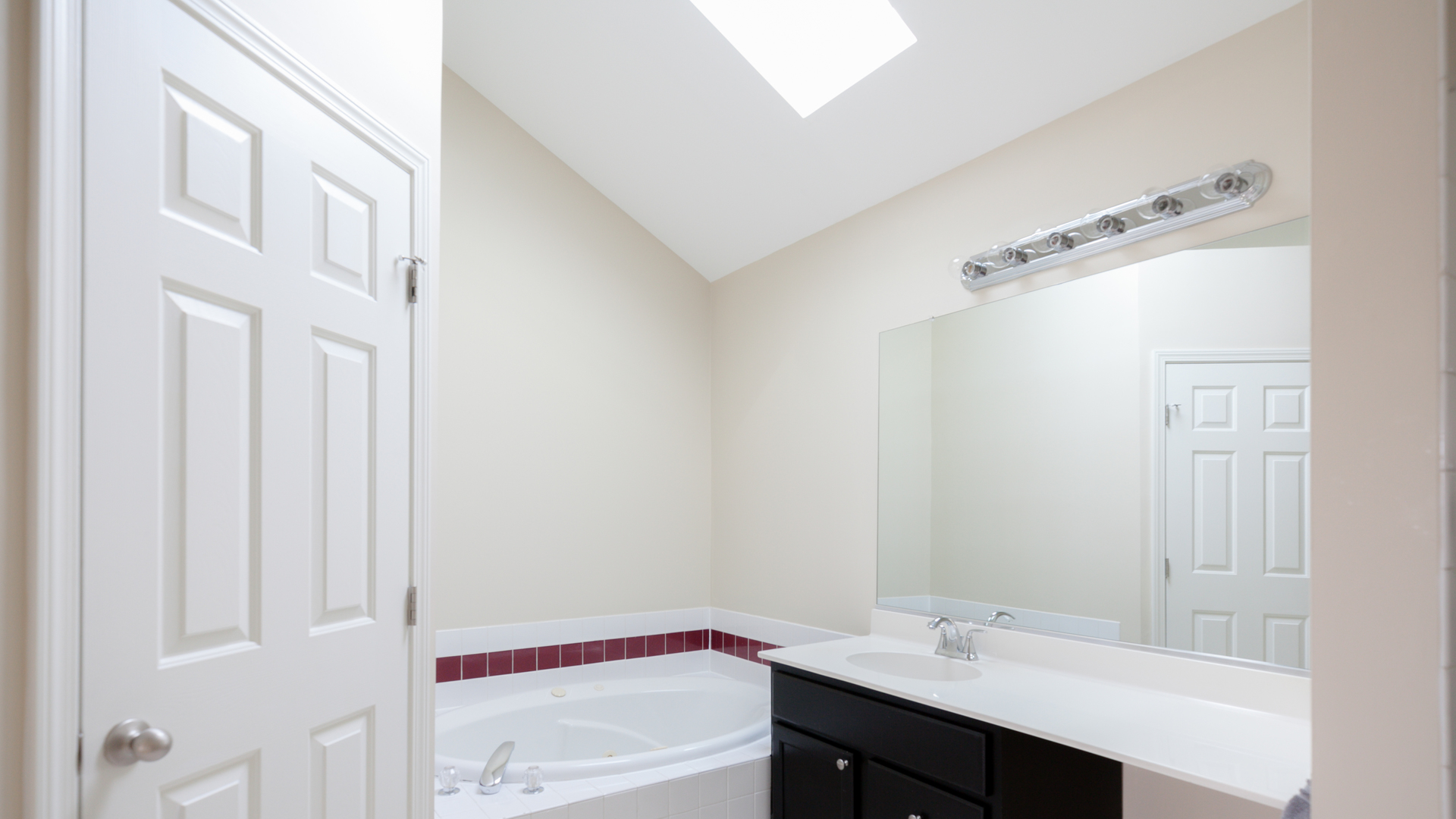24856 Vermette Road Plainfield, IL 60585 - Photo 17 of 18 a bathroom with a sink and a mirror