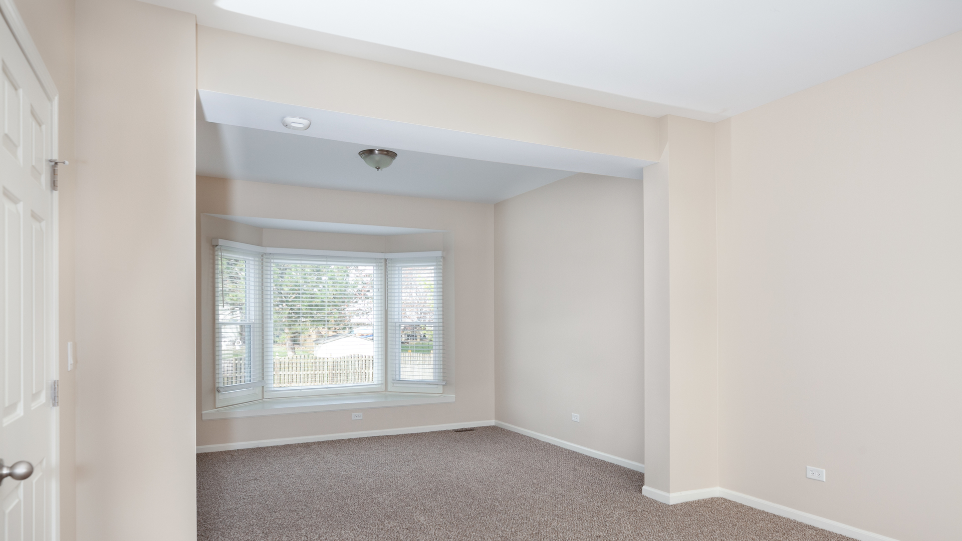 24856 Vermette Road Plainfield, IL 60585 - Photo 8 of 18 a view of an empty room with a window