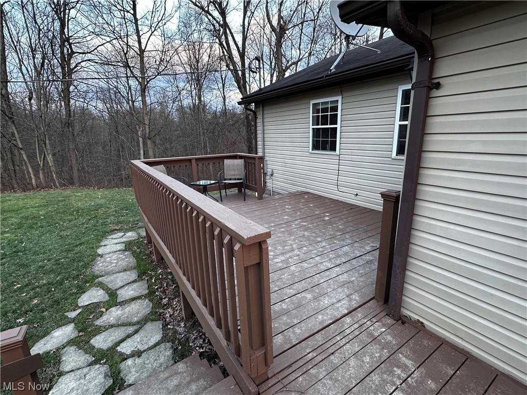 50748 Shenandoah Road Caldwell, OH 43724 - Photo 19 of 43 Wooden deck with a lawn