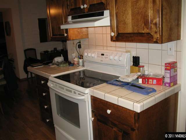 2003 Branch Lane Reno, NV 89509 - Photo 9 of 13 a kitchen that has a sink and a stove