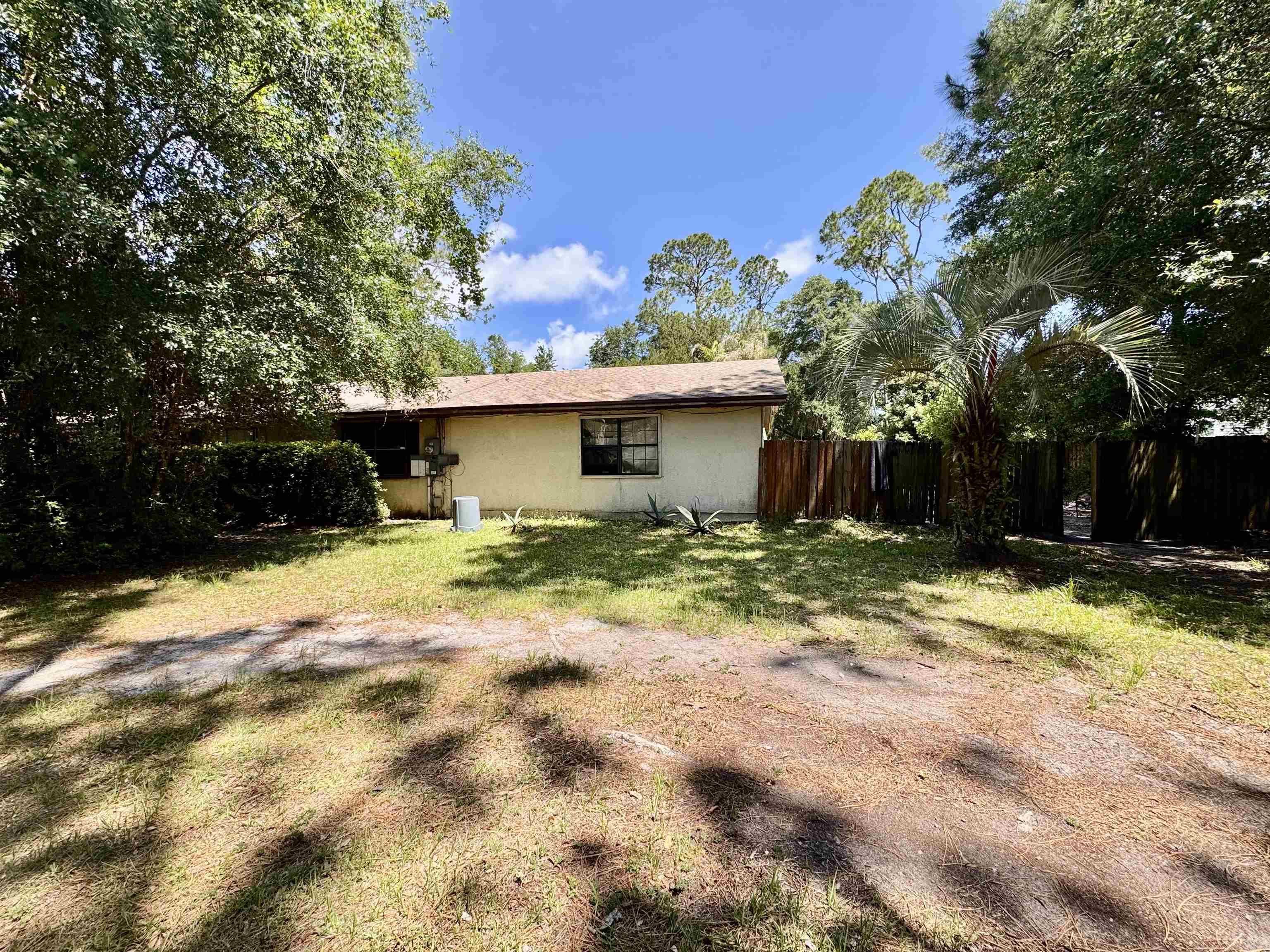 554 Hayley Road St. Augustine, FL 32086 - Photo 6 of 46 a front view of a house with a yard