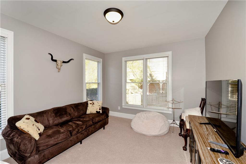 265 Windsor Gate Cove Northeast Atlanta, GA 30342 - Photo 11 of 62 a living room with furniture