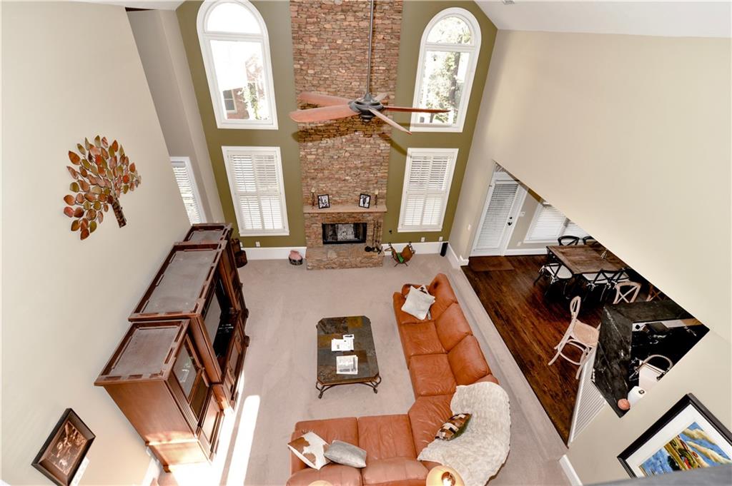 265 Windsor Gate Cove Northeast Atlanta, GA 30342 - Photo 27 of 62 a view of living room with furniture and a mirror