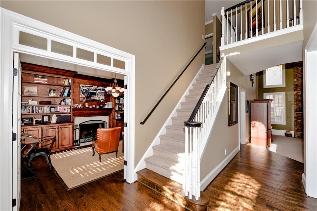 265 Windsor Gate Cove Northeast Atlanta, GA 30342 - Photo 5 of 62 a view of entryway and hall with wooden floor
