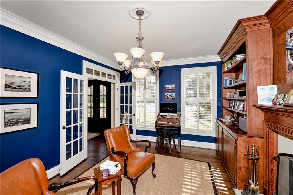 265 Windsor Gate Cove Northeast Atlanta, GA 30342 - Photo 10 of 62 a view of a livingroom with furniture and workspace