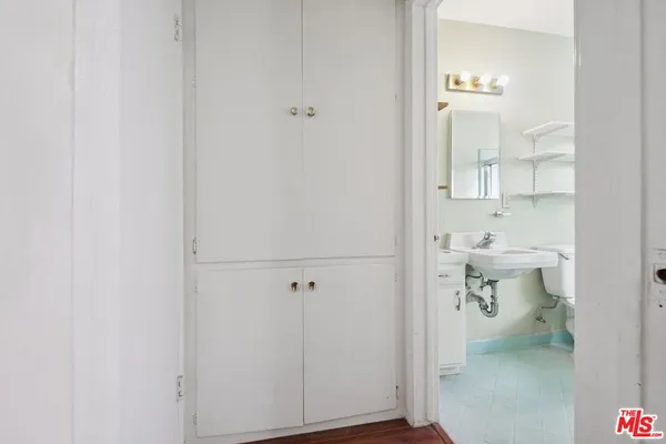 a bathroom with a sink and toilet