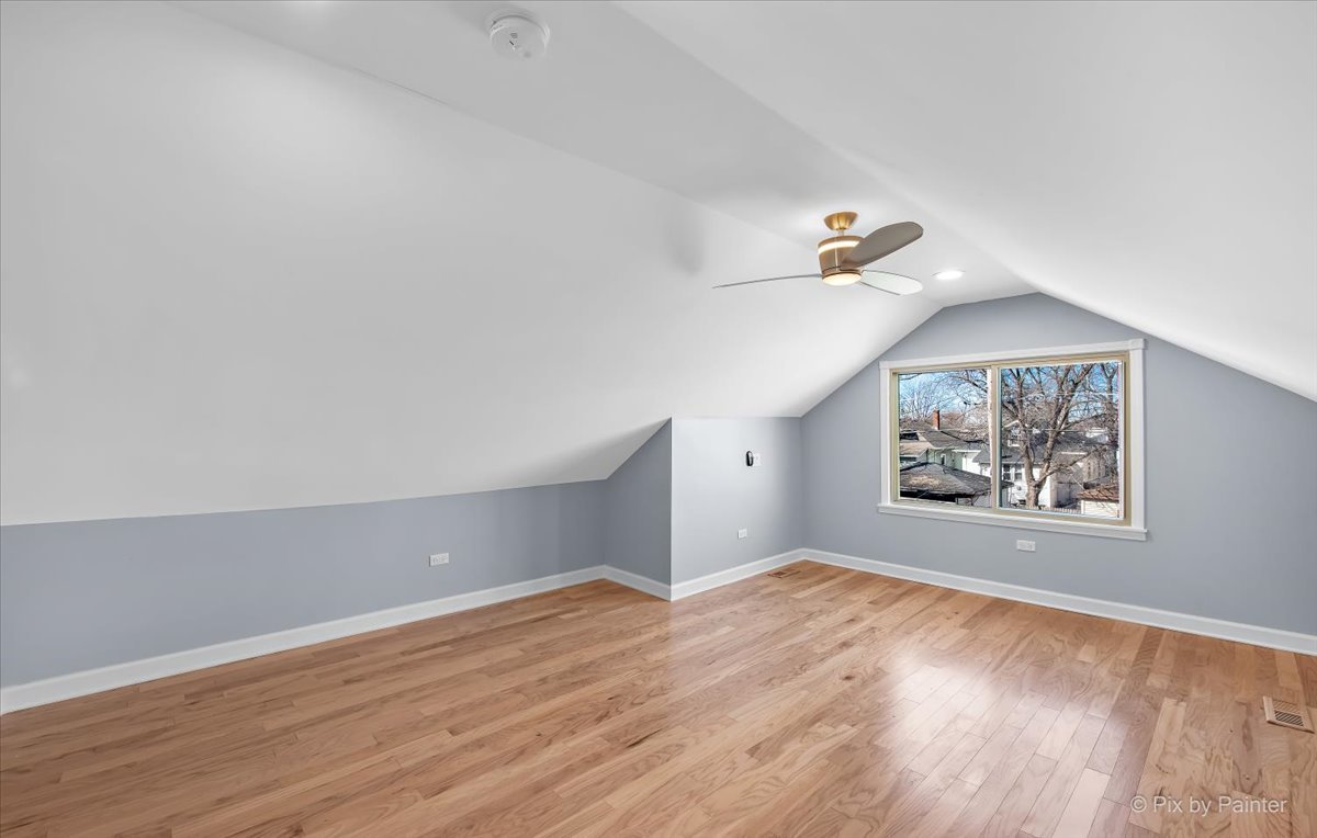 1902 South 9th Avenue Maywood, IL 60153 - Photo 11 of 51 an empty room with wooden floor and windows
