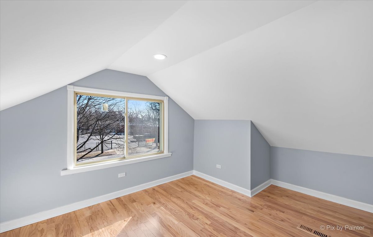 1902 South 9th Avenue Maywood, IL 60153 - Photo 16 of 51 an empty room with window and wooden floor