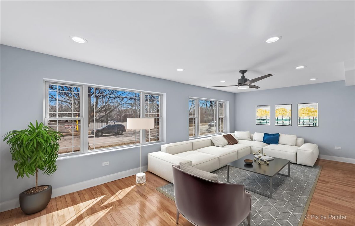1902 South 9th Avenue Maywood, IL 60153 - Photo 27 of 51 a living room with furniture and a potted plant