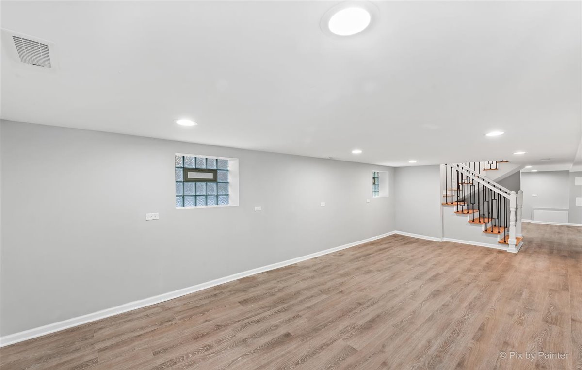 1902 South 9th Avenue Maywood, IL 60153 - Photo 34 of 51 a view of an empty room with wooden floor