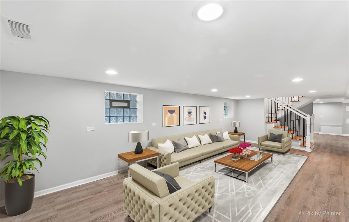 1902 South 9th Avenue Maywood, IL 60153 - Photo 35 of 51 a living room with furniture and a potted plant